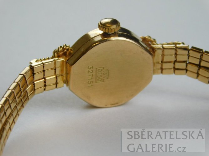 Dámské náramkové hodinky - puncované zlaté 18 k - zn. ROXY - váha 22,1 g