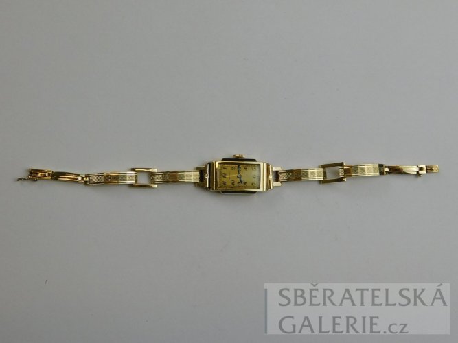 Dámské náramkové hodinky - puncované zlaté 18 k - zn. MOVADO - váha 14,8 g