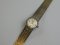 Dámské náramkové hodinky - puncované zlaté / bílé zlato 18 k - zn. OMEGA - váha 37,8 g
